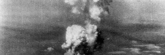 The mushroom cloud rising over Hiroshima, Japan, after the nuclear bomb attack.