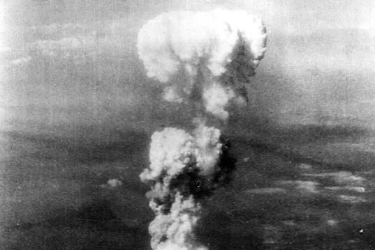 The mushroom cloud rising over Hiroshima, Japan, after the nuclear bomb attack.